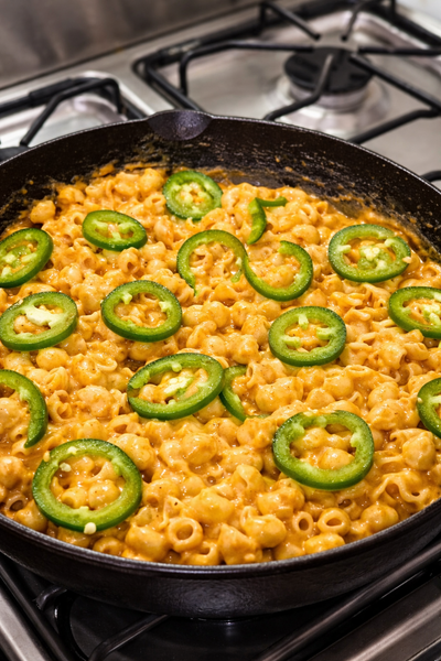Jalapeño mac and cheese with melted cheese topping - high-protein comfort food recipe by LockInWithMili